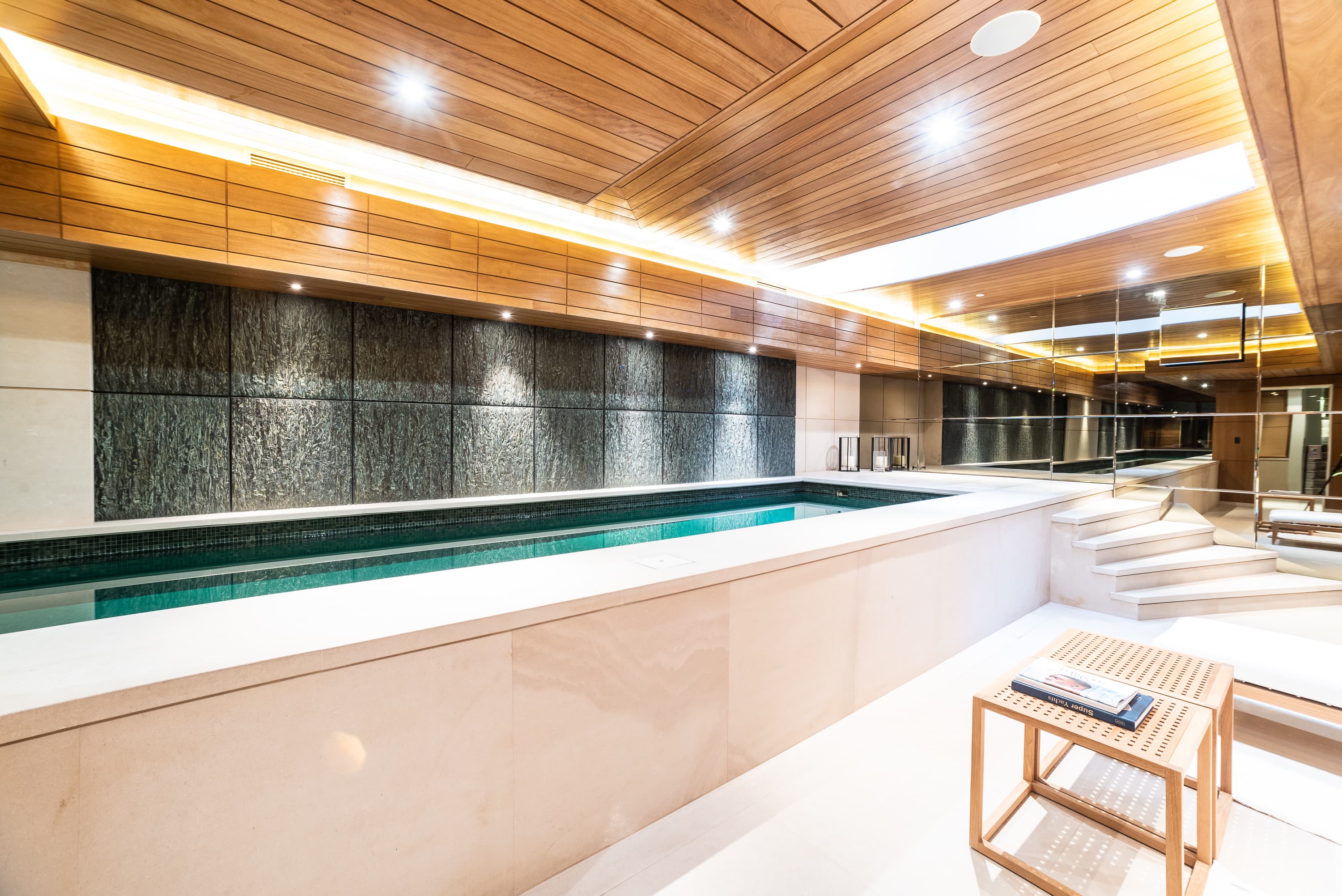 Private indoor swimming pool with timber ceiling