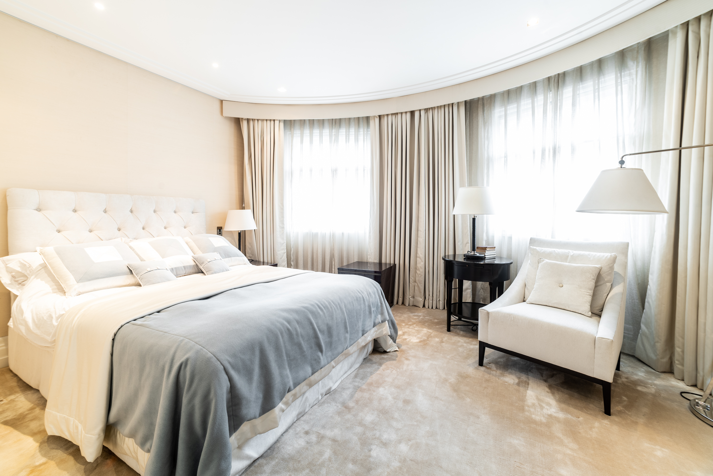 Master bedroom with curved bay windows